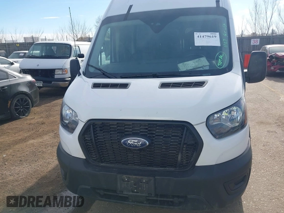 2023 Ford Transit Cargo with VIN 1FTBR3U80PKA41338, listed as a IAAI auction lot 41479619 with 62,136 mi miles and . Bid and sale history available at DreamBid. Image 12.