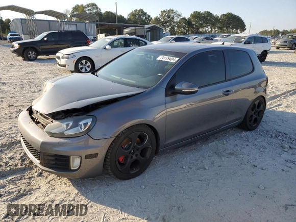 2010 Volkswagen GTI w/Sunroof with VIN WVWEV7AJ2AW239345, listed as a Copart auction lot 74179404 with 180,064 mi miles and Salvage Title. Bid and sale history available at carsss.com. Image 1.