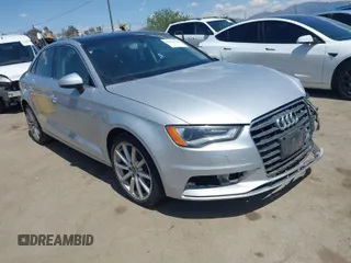 2015 Audi A3 1.8T Premium with VIN WAUACGFF2F1001604, listed as a IAAI auction lot 41975125 with 128,136 mi miles. Bid and sale history available at carsss.com. Image 1.