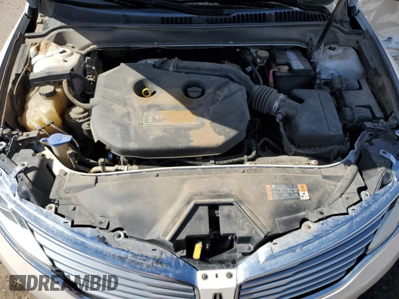 2014 Lincoln MKZ z VIN 3LN6L2G91ER820544, wystawiony jako Copart lot #56049535 z przebiegiem 211 323 mil mil oraz Szkoda całkowita • Salvage title. Historia ofert i sprzedaży dostępna na DreamBid. Obrazek 11.