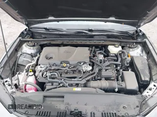 2025 Toyota Camry LE z VIN 4T1DAACK5SU527380, wystawiony jako IAAI lot #42116438 z przebiegiem 4 917 mil mil oraz . Historia ofert i sprzedaży dostępna na DreamBid. Obrazek 10.