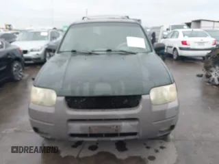 2001 Ford Escape XLT with VIN 1FMCU03101KC25039, listed as a IAAI auction lot 41900122 with 218,126 mi miles. Bid and sale history available at carsss.com. Image 12.