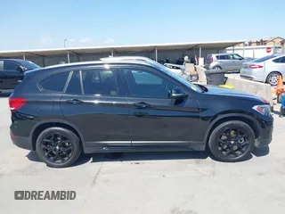 2021 BMW X1 sDrive28i with VIN WBXJG7C07M3M65841, listed as a IAAI auction lot 41877032 with 79,817 mi miles and . Bid and sale history available at DreamBid. Image 13.
