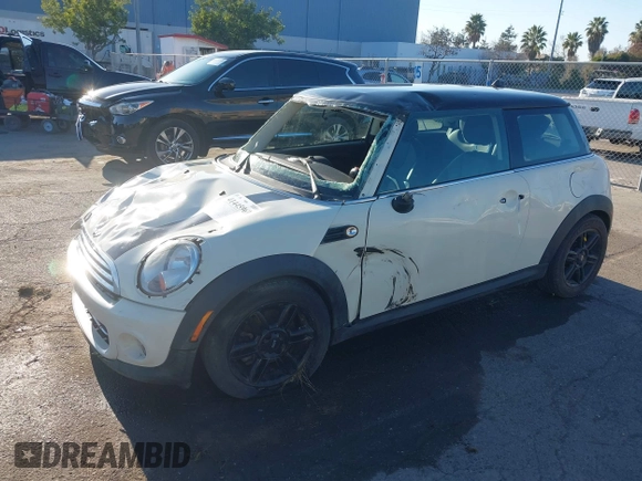 2013 MINI Hardtop with VIN WMWSU3C59DT686286, listed as a IAAI auction lot 41445969 with 85,214 mi miles and . Bid and sale history available at DreamBid. Image 2.
