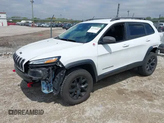 2014 Jeep Cherokee Trailhawk с VIN 1C4PJMBB2EW309183, выставлен на аукционе IAAI как лот 42197601 с пробегом 77 050 миль миль и . История ставок и продаж доступна на DreamBid. Изображение 2.