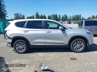 2019 Hyundai Santa Fe SE with VIN 5NMS2CAD9KH122140, listed as a IAAI auction lot 42616171 with 50,794 mi miles and . Bid and sale history available at DreamBid. Image 14.