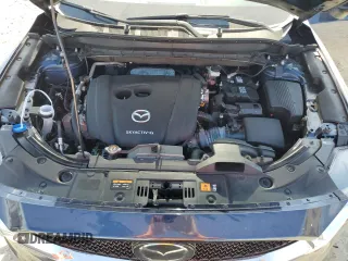 2021 Mazda CX-5 Grand Touring with VIN JM3KFBDM4M1462570, listed as a Copart auction lot 54827675 with 45,389 mi miles and Salvage Title. Bid and sale history available at DreamBid. Image 12.