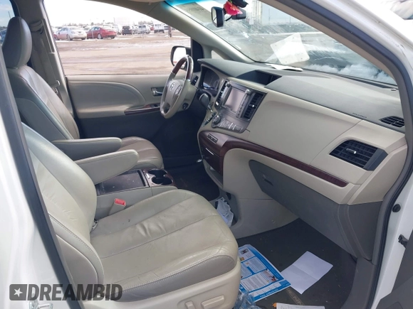 2011 Toyota Sienna XLE AAS with VIN 5TDYK3DC8BS045352, listed as a IAAI auction lot 41401955 with 142,492 mi miles and . Bid and sale history available at DreamBid. Image 5.