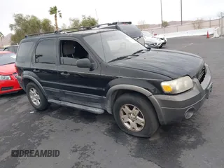 2006 Ford Escape XLT with VIN 1FMYU03156KA42961, listed as a IAAI auction lot 41820423 with 168,212 mi miles. Bid and sale history available at carsss.com. Image 1.