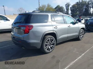 2021 GMC Acadia SLE with VIN 1GKKNKLA4MZ168921, listed as a IAAI auction lot 41562602 with 26,370 mi miles and . Bid and sale history available at DreamBid. Image 4.