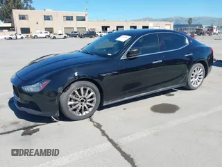 2014 Maserati Ghibli z VIN ZAM57XSA5E1091490, wystawiony jako IAAI lot #41848480 z przebiegiem 129 585 mil mil oraz . Historia ofert i sprzedaży dostępna na DreamBid. Obrazek 2.