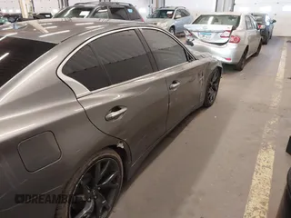 2015 Infiniti Q50 Premium with VIN JN1BV7AP2FM345954, listed as a IAAI auction lot 41514027 with 79,957 mi miles. Bid and sale history available at carsss.com. Image 6.
