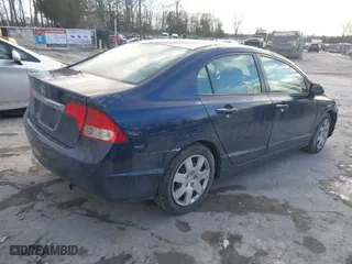 2009 Honda Civic Sdn LX with VIN 2HGFA16509H530382, listed as a IAAI auction lot 41279292 with 282,117 mi miles. Bid and sale history available at carsss.com. Image 4.