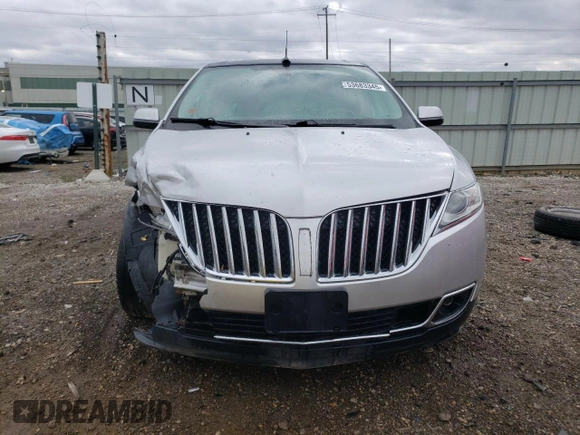 2011 Lincoln MKX z VIN 2LMDJ8JK2BBJ32076, wystawiony jako Copart lot #53683345 z przebiegiem 131 501 mil mil oraz Szkoda całkowita • Salvage title. Historia ofert i sprzedaży dostępna na DreamBid. Obrazek 5.