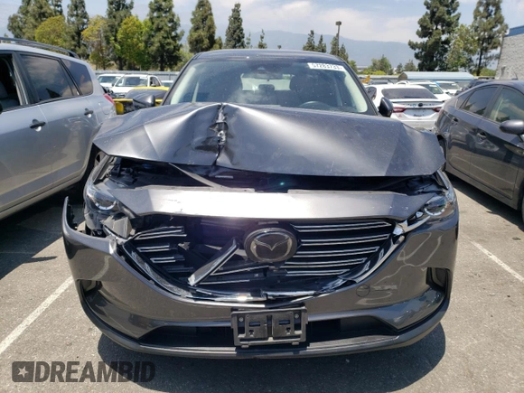 2020 Mazda CX-9 Sport with VIN JM3TCABYXL0423435, listed as a Copart auction lot 57283733 with 27,169 mi miles and . Bid and sale history available at DreamBid. Image 5.