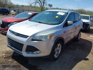 2015 Ford Escape SE with VIN 1FMCU0G74FUB93125, listed as a IAAI auction lot 41923277 with 203,183 mi miles. Bid and sale history available at carsss.com. Image 2.