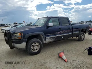 2002 GMC Sierra 2500HD SLE with VIN 1GTHC23G02F135204, listed as a Copart auction lot 74266184 with 207,017 mi miles and Salvage title. Bid and sale history available at DreamBid. Image 1.