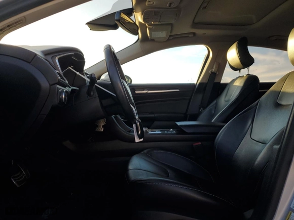 2017 Ford Fusion Energi Titanium with VIN 3FA6P0SUXHR379807, listed as a Copart auction lot 84885494 with 100,735 mi miles and Salvage Title. Bid and sale history available at carsss.com. Image 7.