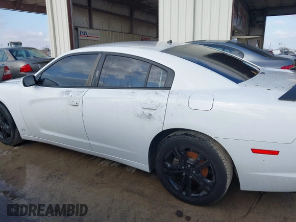 2011 Dodge Charger RT Plus with VIN 2B3CM5CT9BH591577, listed as a IAAI auction lot 41502815 with 126,750 mi miles. Bid and sale history available at carsss.com. Image 14.