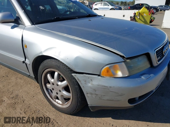 1998 Audi A4 with VIN WAUGD28D5WA235015, listed as a IAAI auction lot 41744703 with 233,432 mi miles. Bid and sale history available at carsss.com. Image 6.