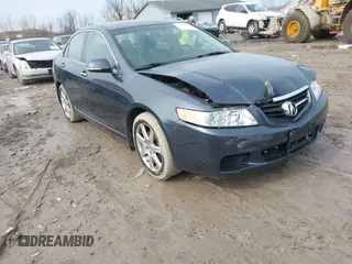 2005 Acura TSX with VIN JH4CL96865C021123, listed as a IAAI auction lot 41704358 with 156,836 mi miles. Bid and sale history available at carsss.com. Image 1.