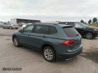 2019 Volkswagen Tiguan S with VIN 3VV1B7AXXKM121963, listed as a IAAI auction lot 40076115 with 167,540 mi miles. Bid and sale history available at carsss.com. Image 3.