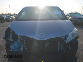 2014 Toyota Sienna LE AAS with VIN 5TDKK3DC1ES520561, listed as a IAAI auction lot 41959565 with 115,908 mi miles and . Bid and sale history available at carsss.com. Image 13.
