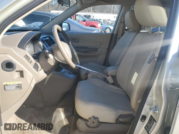 2009 Hyundai Tucson SE with VIN KM8JN72D19U970813, listed as a Copart auction lot 88469545 with 152,648 mi miles and Salvage Title. Bid and sale history available at carsss.com. Image 7.