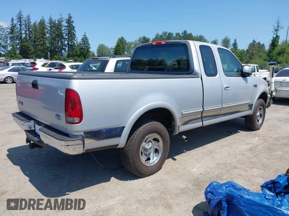 1997 Ford F-150 XL with VIN 1FTDX1868VKB26243, listed as a IAAI auction lot 42383401 with 196,020 mi miles and . Bid and sale history available at DreamBid. Image 4.