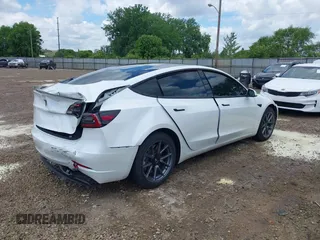 2023 Tesla Model 3 z VIN 5YJ3E1EA8PF608429, wystawiony jako IAAI lot #42345888 z przebiegiem 14 907 mil mil oraz . Historia ofert i sprzedaży dostępna na DreamBid. Obrazek 4.