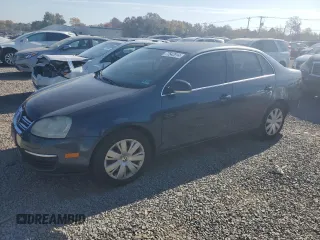 2005 Volkswagen Jetta with VIN 3VWRT71KX5M636062, listed as a Copart auction lot 77542914 with 159,120 mi miles and Salvage title. Bid and sale history available at DreamBid. Image 1.