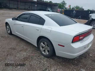 2014 Dodge Charger SE with VIN 2C3CDXBG5EH277920, listed as a IAAI auction lot 42109354 with 146,615 mi miles and . Bid and sale history available at carsss.com. Image 3.