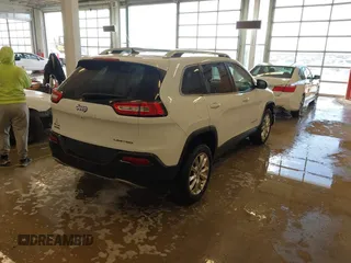 2015 Jeep Cherokee Limited with VIN 1C4PJMDS2FW682142, listed as a IAAI auction lot 41399903 with 124,918 mi miles and . Bid and sale history available at DreamBid. Image 4.