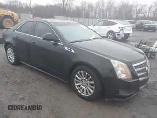 2011 Cadillac CTS z VIN 1G6DA5EY5B0102006, wystawiony jako IAAI lot #41463229 z przebiegiem 134 336 mil mil oraz . Historia ofert i sprzedaży dostępna na DreamBid. Obrazek 1.
