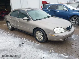 2003 Mercury Sable LS Premium with VIN 1MEHM55SX3A614274, listed as a IAAI auction lot 41564448 with 245,449 mi miles. Bid and sale history available at carsss.com. Image 1.