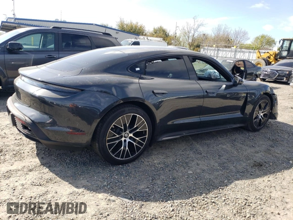 2023 Porsche Taycan with VIN WP0AA2Y18PSA16703, listed as a Copart auction lot 50559135 with 11,428 mi miles and Salvage Title. Bid and sale history available at DreamBid. Image 3.
