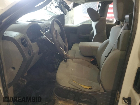 2007 Ford F-150 XL with VIN 1FTRF12237NA02185, listed as a Copart auction lot 52074215 with 204,888 mi miles and Salvage Title. Bid and sale history available at carsss.com. Image 7.