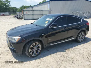 2016 BMW X4 xDrive28i with VIN 5UXXW3C51G0M89636, listed as a Copart auction lot 61989385 with 125,447 mi miles and Clean title. Bid and sale history available at DreamBid. Image 1.
