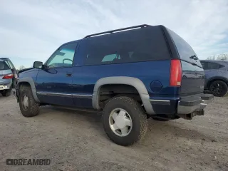 1999 Chevrolet Tahoe with VIN 3GNEK18R4XG124715, listed as a Copart auction lot 84744304 with 276,891 mi miles and Clean Title. Bid and sale history available at carsss.com. Image 2.