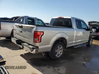 2015 Ford F-150 XL with VIN 1FTEX1C88FFC26544, listed as a Copart auction lot 48242705 with 124,731 mi miles and Salvage Title. Bid and sale history available at carsss.com. Image 3.