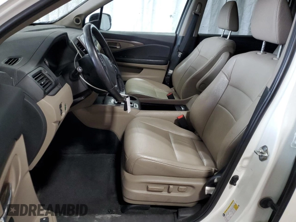 2018 Honda Pilot EX-L with VIN 5FNYF6H58JB040611, listed as a Copart auction lot 63614525 with 148,656 mi miles and Salvage title. Bid and sale history available at DreamBid. Image 7.
