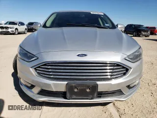 2018 Ford Fusion Titanium с VIN 3FA6P0D93JR207164, выставлен на аукционе Copart как лот 47274035 с пробегом 109 632 миль миль и Чистый • Clean title. История ставок и продаж доступна на DreamBid. Изображение 5.