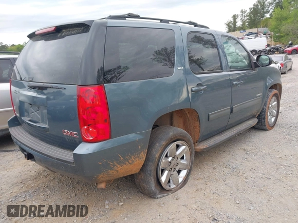 2010 GMC Yukon SLT with VIN 1GKUKCE00AR245212, listed as a IAAI auction lot 42028245 with 245,013 mi miles. Bid and sale history available at carsss.com. Image 4.