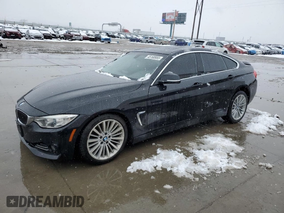 2015 BMW 4 Series 428i xDrive with VIN WBA4C9C54FD330601, listed as a Copart auction lot 45168955 with 112,408 mi miles and Salvage title. Bid and sale history available at DreamBid. Image 1.