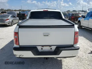 2010 Honda Ridgeline RTL with VIN 5FPYK1F51AB011041, listed as a Copart auction lot 77210844 with 81,265 mi miles and Salvage Title. Bid and sale history available at carsss.com. Image 6.