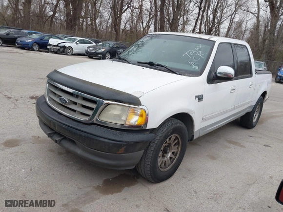 2001 Ford F-150 SuperCrew XLT with VIN 1FTRW07L61KB49220, listed as a IAAI auction lot 41826223 with 281,547 mi miles. Bid and sale history available at carsss.com. Image 2.
