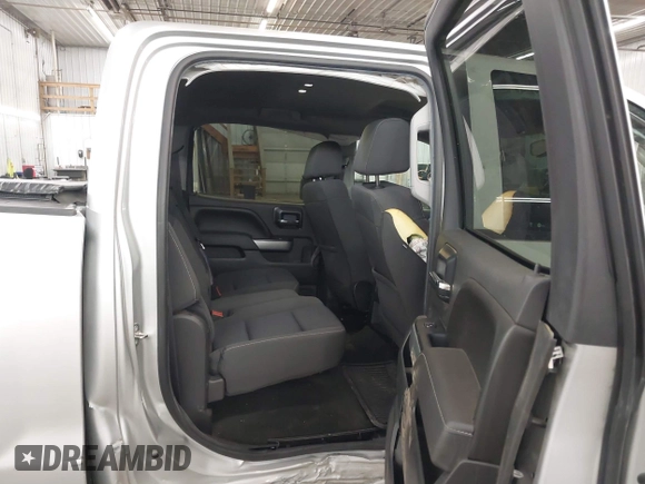 2017 Chevrolet Silverado 1500 LT with VIN 3GCUKREC5HG318772, listed as a IAAI auction lot 42056116 with 82,987 mi miles and . Bid and sale history available at DreamBid. Image 8.