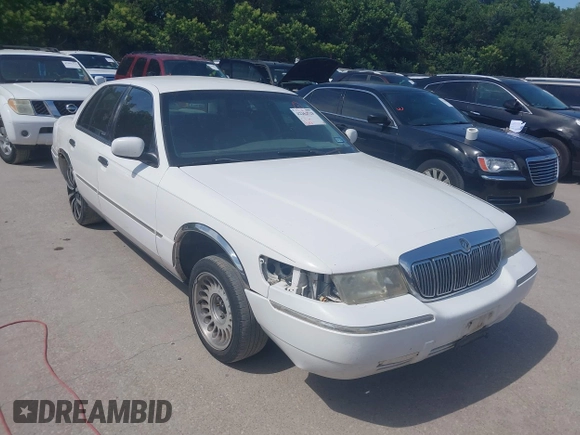 2000 Mercury Grand Marquis LS z VIN 2MEFM75W2YX731383, wystawiony jako IAAI lot #42262528 z przebiegiem 172 940 mil mil oraz . Historia ofert i sprzedaży dostępna na DreamBid. Obrazek 1.