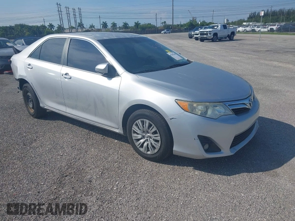 2012 Toyota Camry L z VIN 4T1BF1FK7CU001984, wystawiony jako IAAI lot #41585144 z przebiegiem 20 585 mil mil oraz . Historia ofert i sprzedaży dostępna na DreamBid. Obrazek 1.