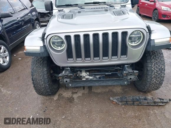 2018 Jeep Wrangler Unlimited Rubicon with VIN 1C4HJXFG4JW174603, listed as a IAAI auction lot 42202302 with 120,229 mi miles and . Bid and sale history available at DreamBid. Image 6.